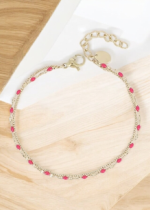 Bracelet fin doré et perles rouges